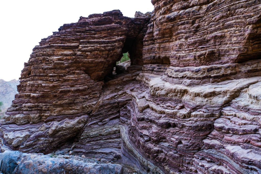 Spectrum Hike has picturesque views with its layers of rocks, a beautiful landscape, and a light breeze. Spectrum Hike is located at Wadi Ghub in Fujairah. These scenic mountains are popular for their multi-colored rock formations throughout the valley. Also known as Rainbow Mountains.